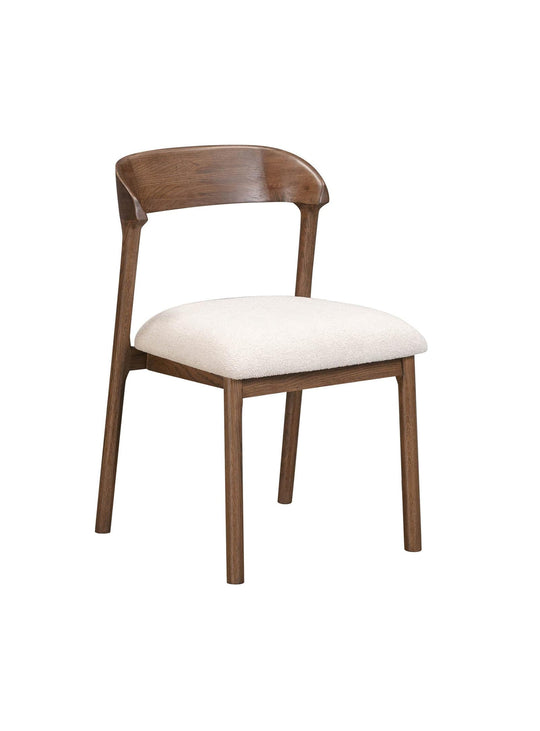 Abstract : chaise contemporaine en bois massif et tissu doux.