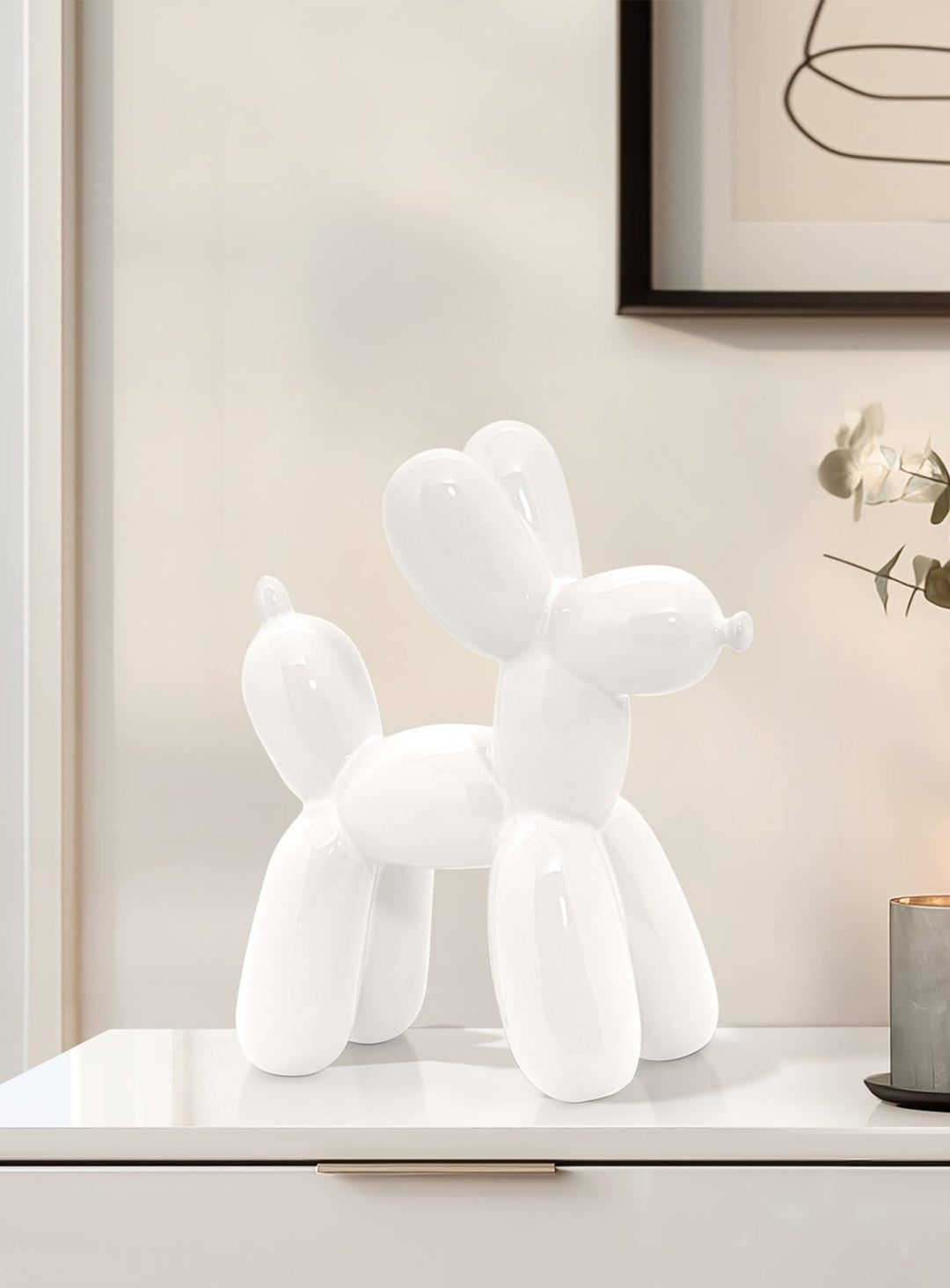 Sculpture en céramique chien ballon : icône joyeuse pour intérieur original. Blanc.