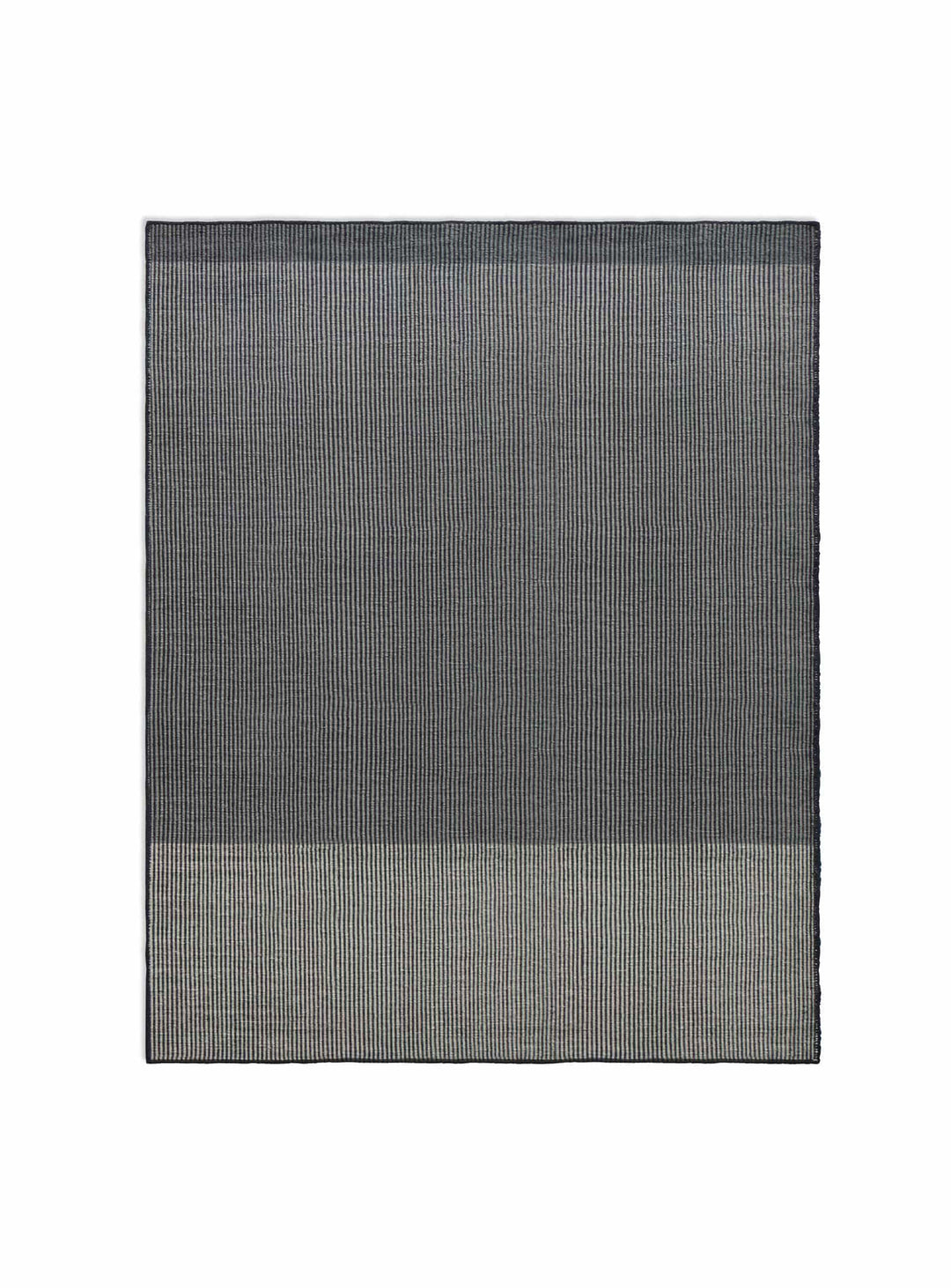 Le tapis Bousta de Blu Dot allie simplicité graphique et confort naturel. mix 1