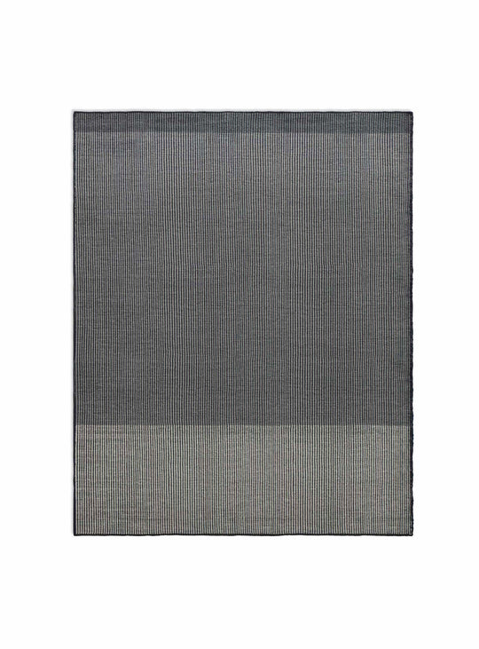 Le tapis Bousta de Blu Dot allie simplicité graphique et confort naturel. mix 1