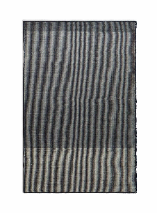 Tapis Bousta signé Blu Dot : lignes subtiles et chaleur artisanale. mix 1