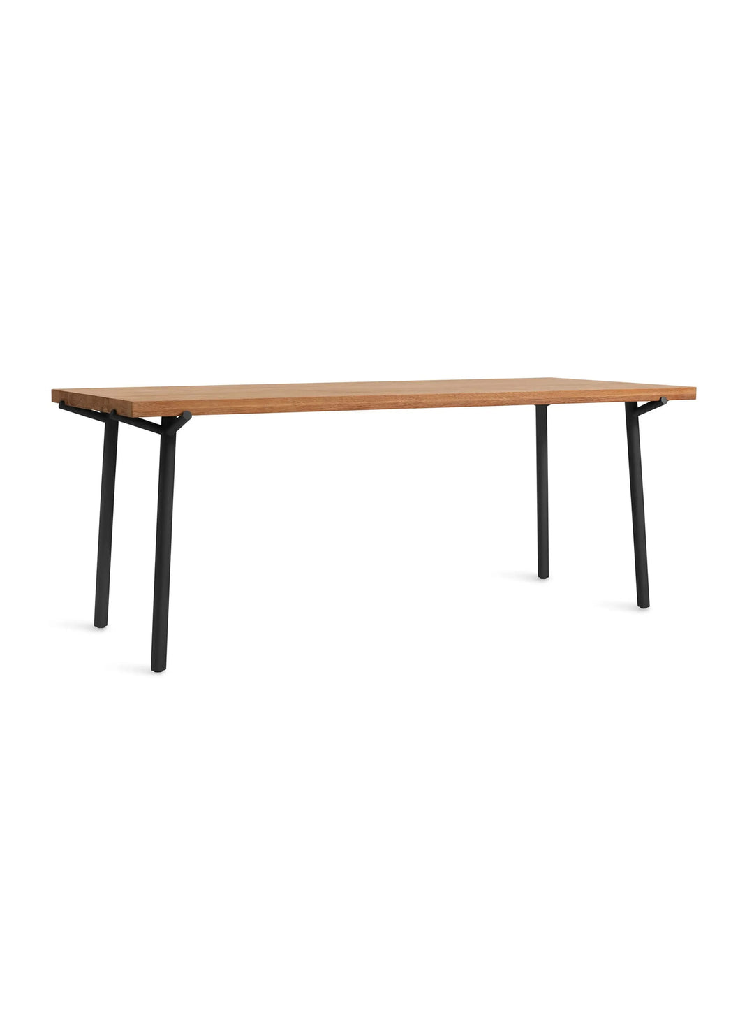 La table à manger Blu Dot Branch apporte chaleur et modernité à votre intérieur. chene et noir