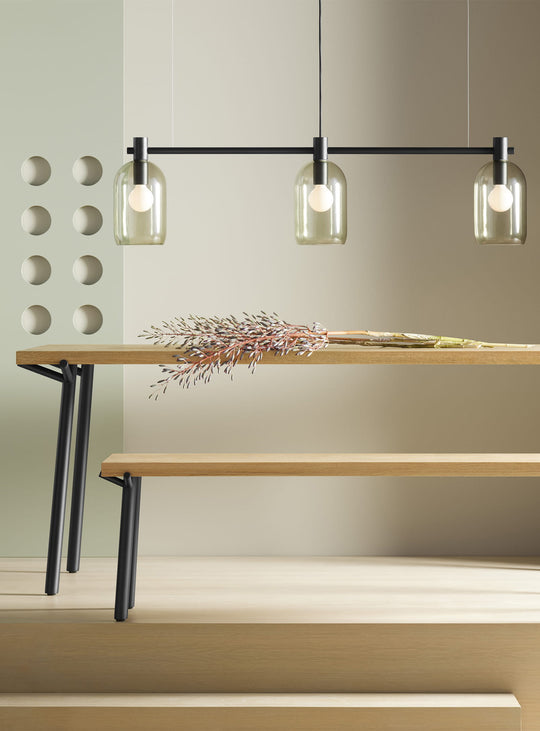 Table à manger Blu Dot Branch : un design sculptural en bois massif et acier. chene et noir