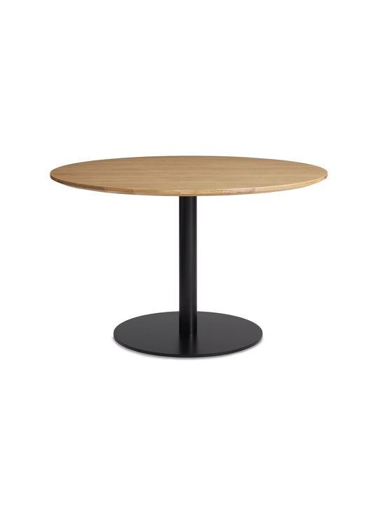 Table à dîner ronde Blu Dot Easy, une pièce chic pour des moments partagés. chene blanc, noir