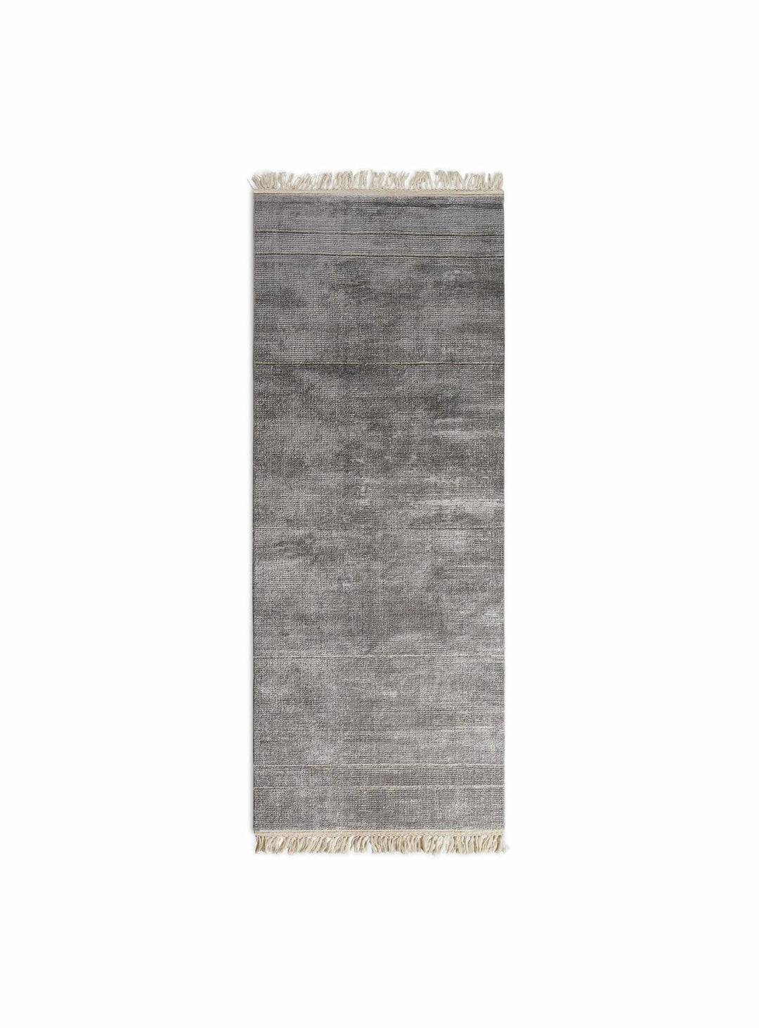 Tapis Fancy Blu Dot : texture dense, éclat doux et savoir-faire artisanal. Bleu glace