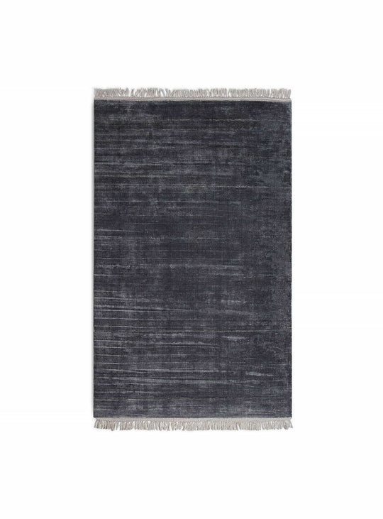 Le tapis Fancy de Blu Dot, touche élégante et lumineuse pour votre décor. Indigo