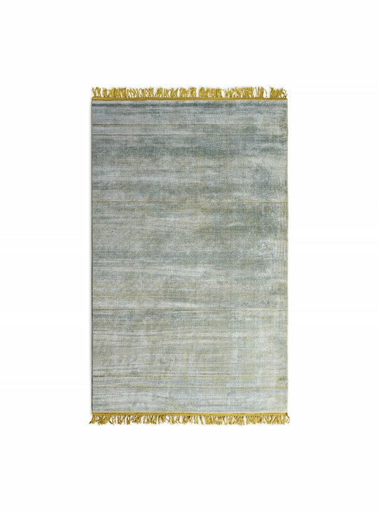 Le tapis Fancy de Blu Dot allie douceur, lumière et style contemporain. Lime