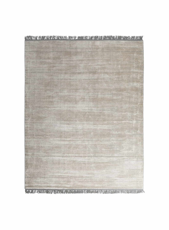 Le tapis Fancy Blu Dot, mélange parfait de matière, style et confort. Béton