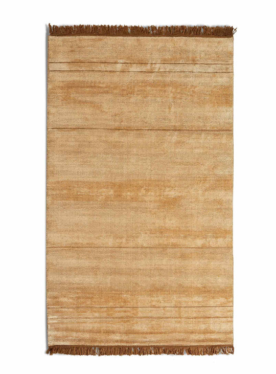 Tapis Fancy Blu Dot : laine, viscose et reflets subtils pour tout intérieur. Or