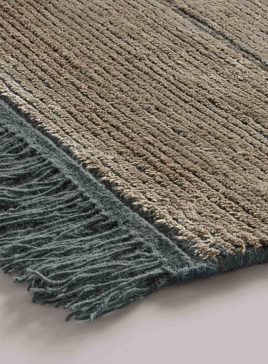 Le tapis Fancy de Blu Dot illumine chaque pièce avec ses tons subtils. Béton