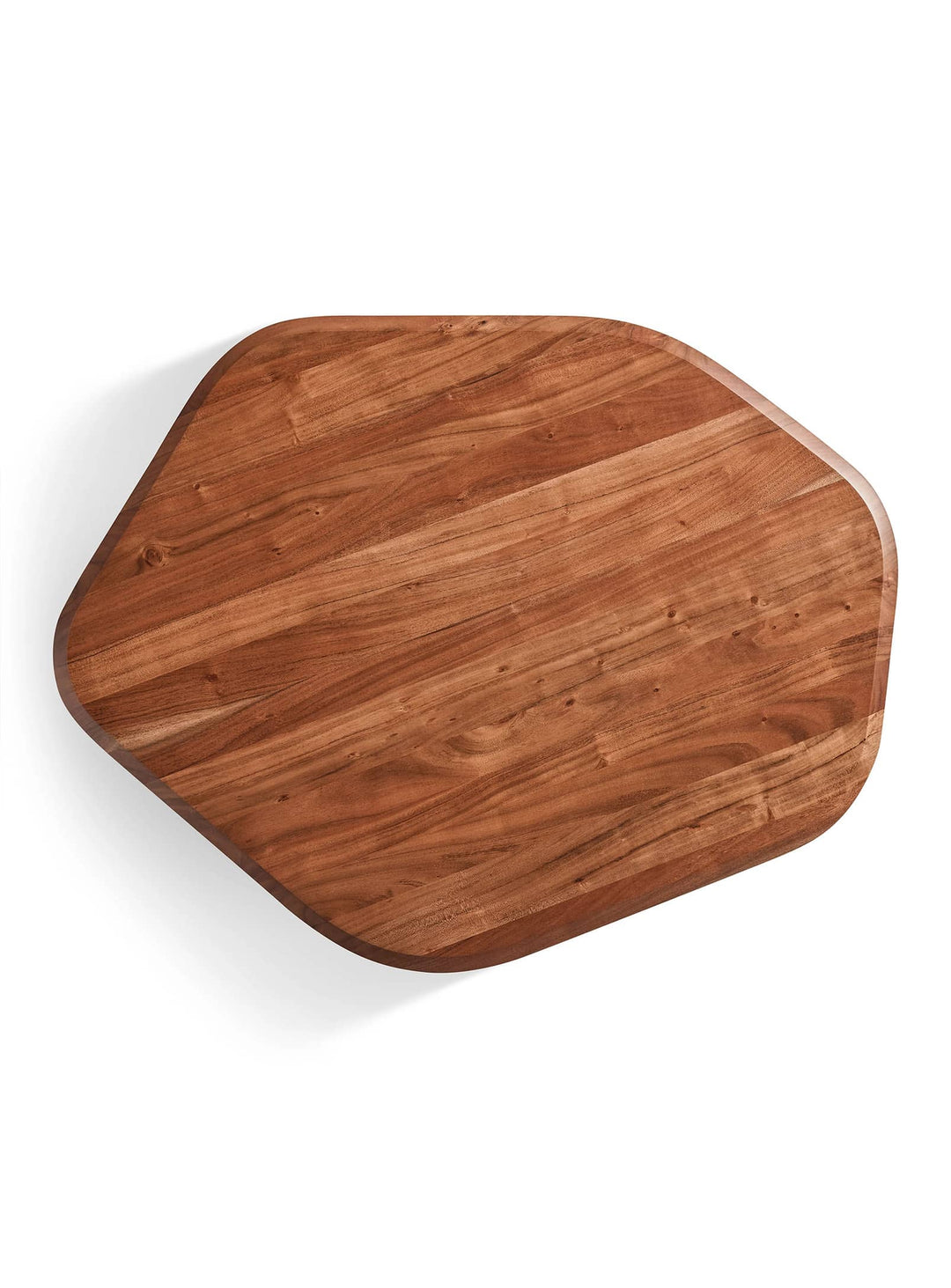 Table à café Blu Dot Hoard avec silhouette organique et fabrication en bois d'acacia massif.