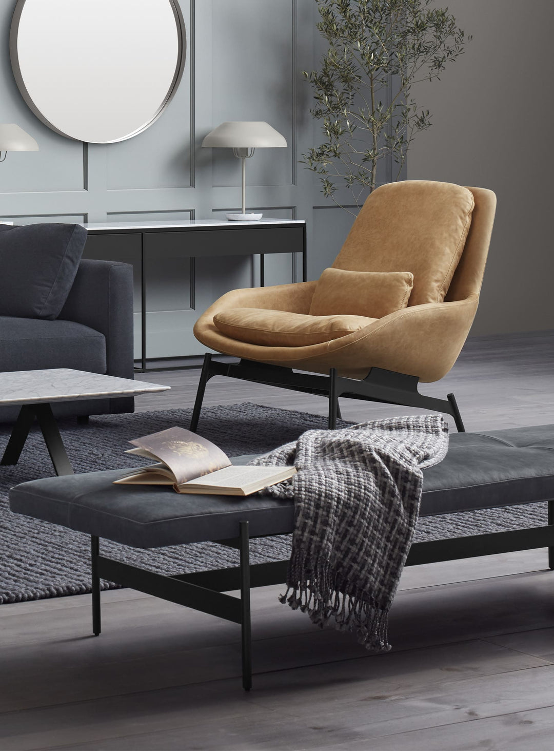 Banc Jumbo Blu Dot : banc design, assise rembourrée et structure acier. ink leather