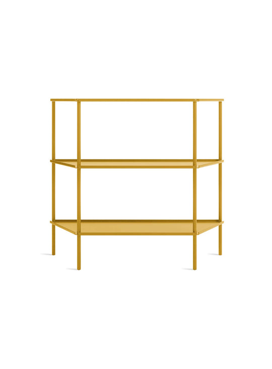 Bibliothèque Not for Nothing, élégance trapézoïdale et légèreté visuelle. moutarde