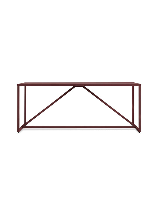 Table à dîner Strut Blu Dot : design équilibré et esprit créatif. rouge