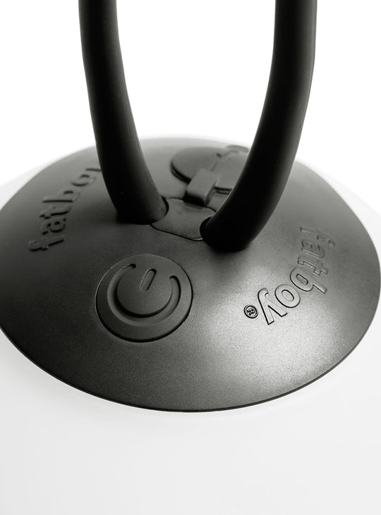 Lampe nomade Fatboy Bolleke la Surprise : éclairage LED compact, sans fil et facile à suspendre partout.
