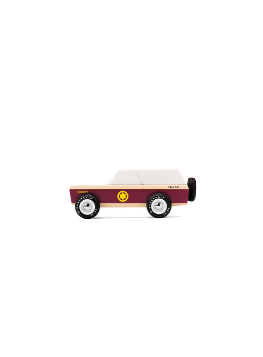 Voiture du shérif Candylab, design vintage parfait pour aventures de cow-boys.