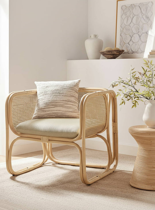 Fauteuil lounge Ellis : design en rotin naturel et allure décontractée. Naturel.