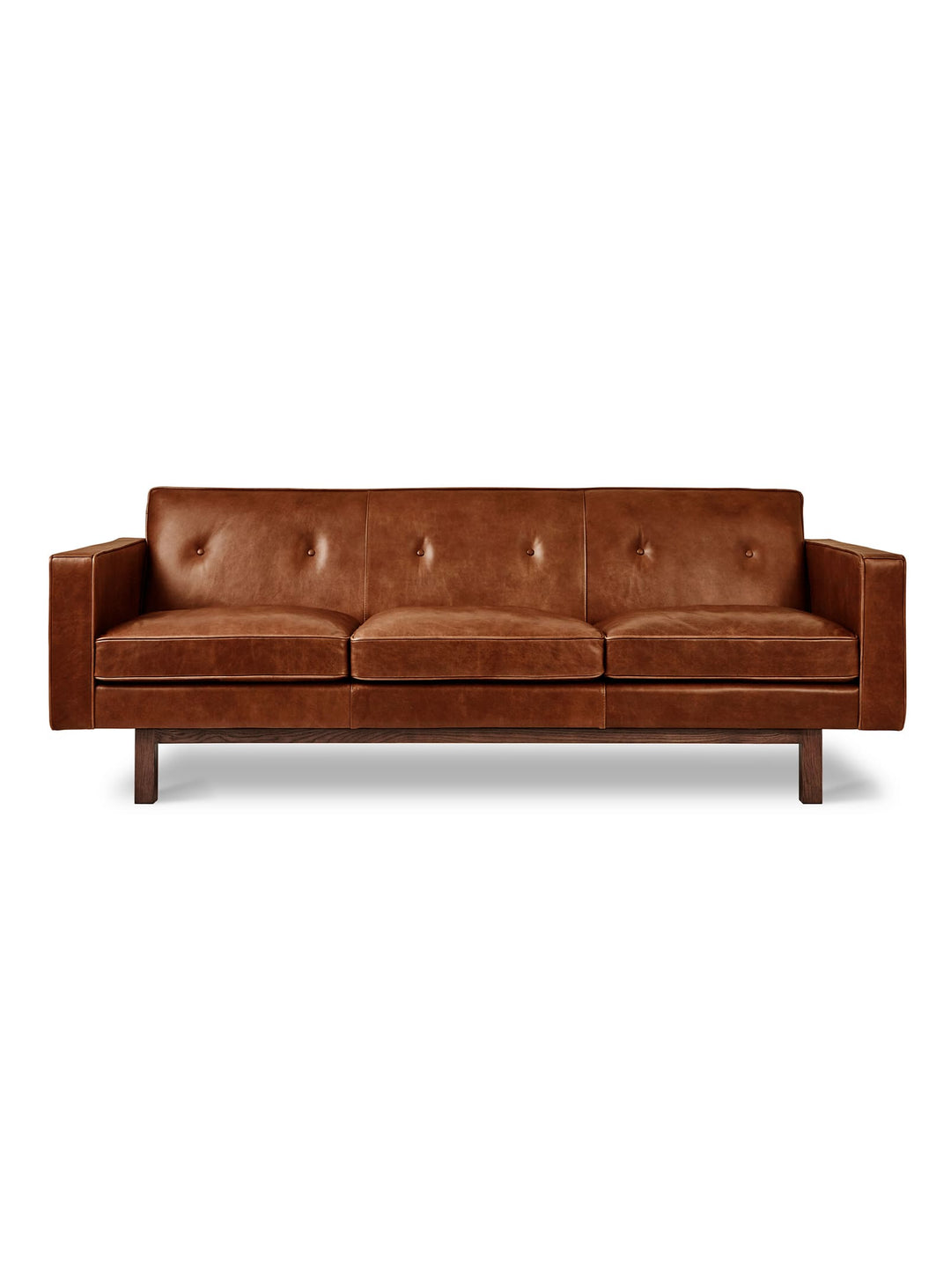 Le sofa Embassy de Gus* Modern : luxe des plumes et élégance du cuir.Cuir brun