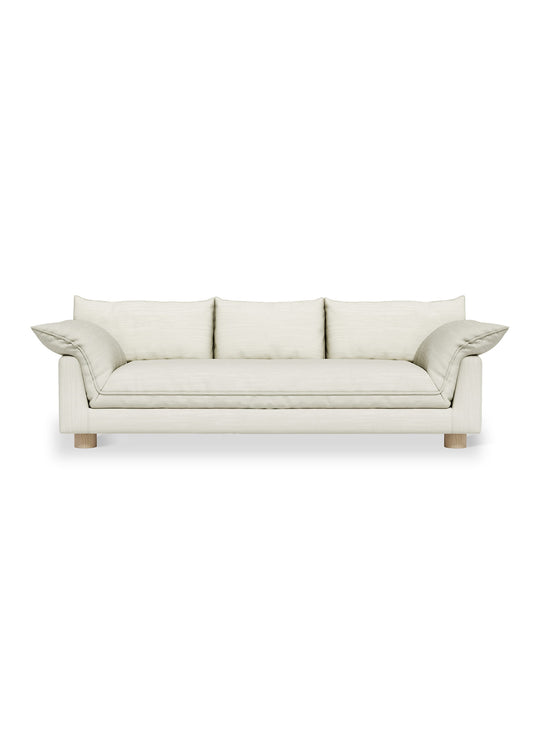 Sofa Gus* Modern Zoe : un canapé généreux au style seventies avec coussins doux et structure en bois FSC. sutton canvas