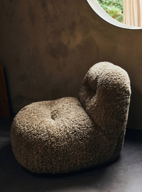 Fauteuil Meloa HKliving en tissu texturé pour une ambiance raffinée et accueillante. poodle