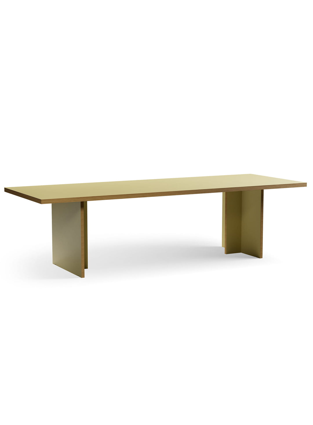 Table Monolyt HKliving, esthétique épurée et présence sculpturale dans la salle à manger. olive