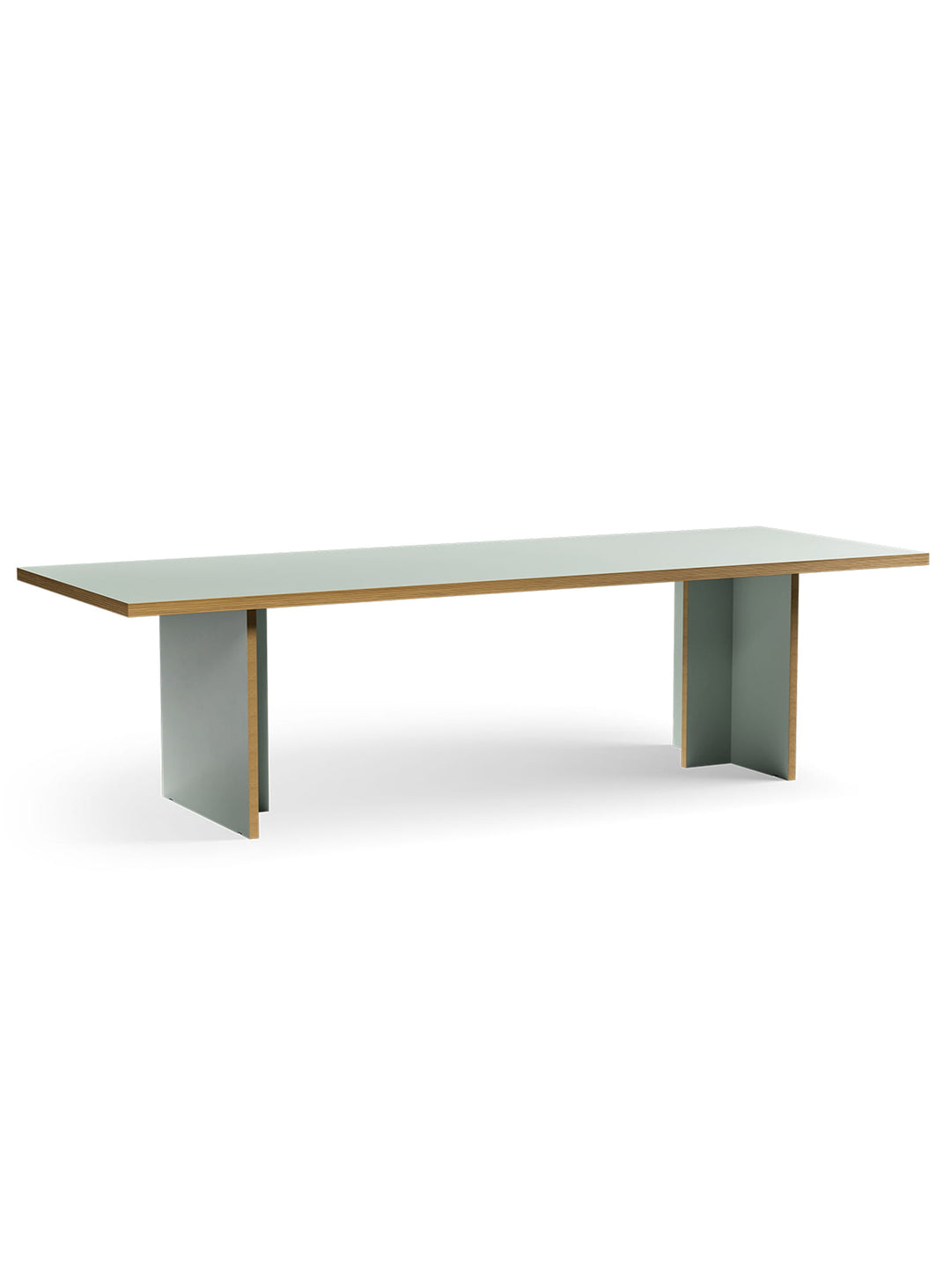 Table Monolyt HKliving, meuble design avec proportions généreuses et look architectural. vert pâle