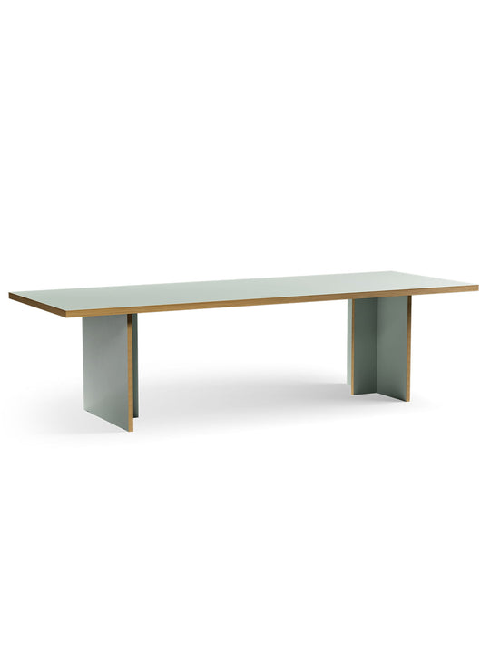 Table Monolyt HKliving, meuble design avec proportions généreuses et look architectural. vert pâle