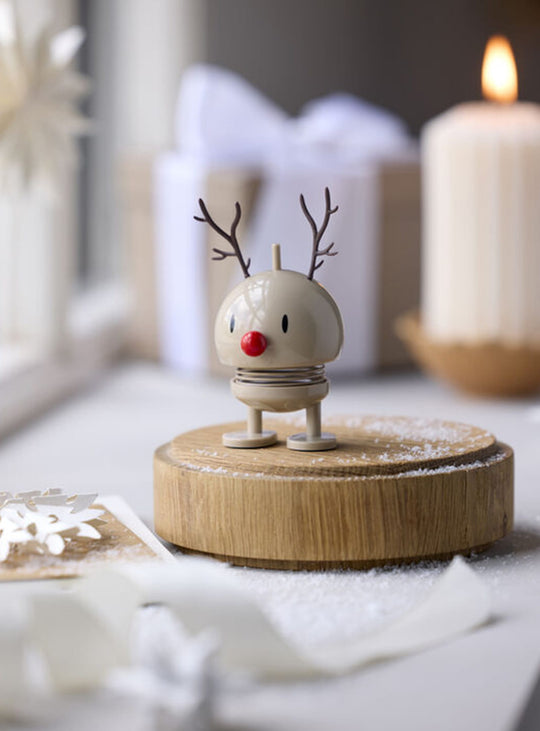 Figurine Renne Bumble Hoptimist, un petit renne de Noël qui oscille doucement au moindre contact.