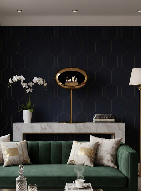 Cheminée autoportante Low Dome en or rose de Le Feu : chic et éclatante.