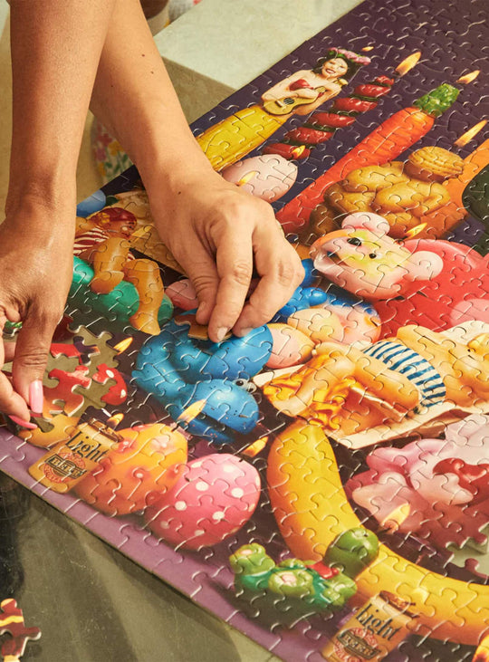Puzzle Lighten Up Le Puzz : casse-tête 500 pièces au design bougies décalées.