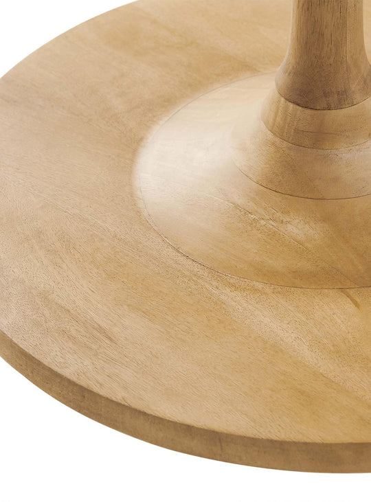 La table à café ronde Lina apporte chaleur et caractère à votre salon.