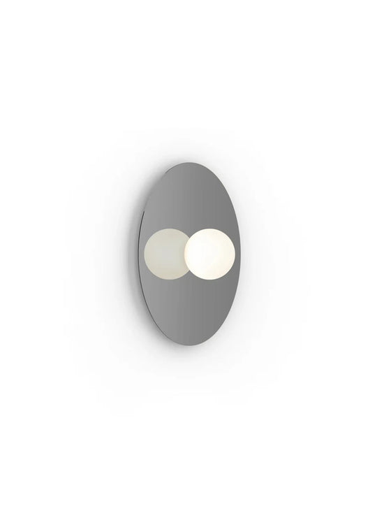Applique Bola Disc Flush Pablo Designs, un modèle contemporain qui apporte une lumière chaude et enveloppante. métal