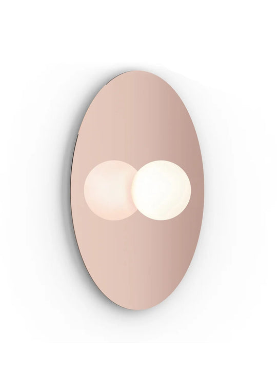 Applique Bola Disc Flush Pablo Designs, une lampe LED qui combine éclairage direct et lumière réfléchie. or rose