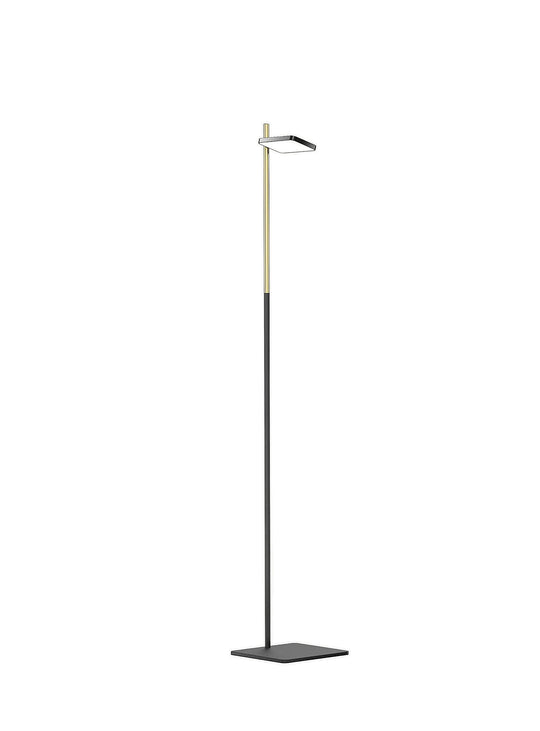 Créez un coin lecture confortable avec la lampe sur pied Talia de Pablo Designs et sa lumière antiéblouissante. noir et laiton
