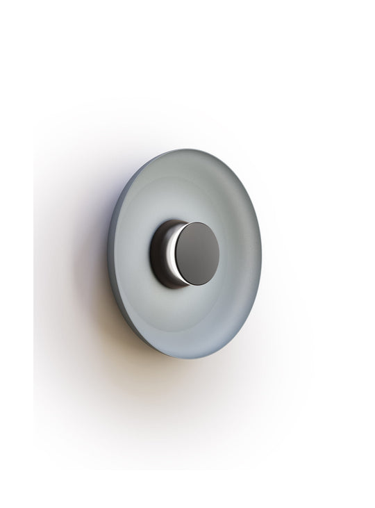 Applique murale Totem Pablo Designs : un halo lumineux subtil au design contemporain.