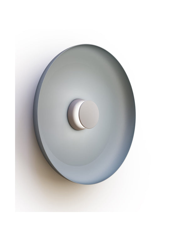 Applique murale Totem Pablo Designs : un design intemporel avec lumière réglable.