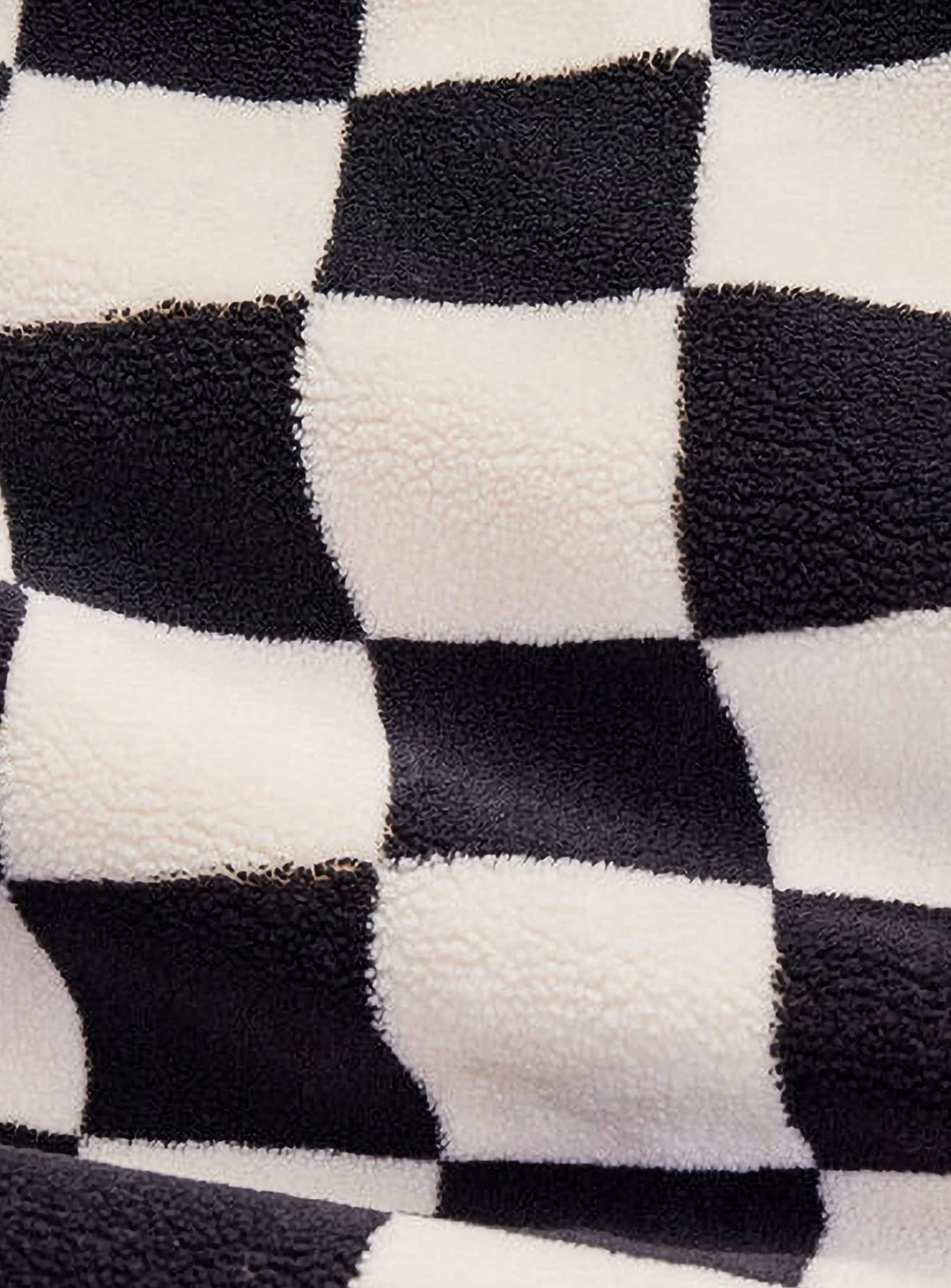 Pouf Point Teddy Chess polyvalent de Fatboy, parfait pour salon, chambre ou coin lecture. noir et creme