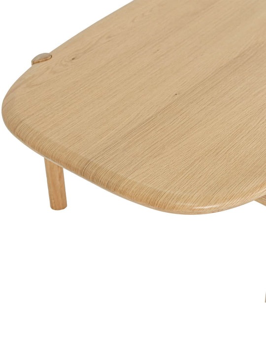 Table à café Runway : plateau arrondi et piètement cylindrique.