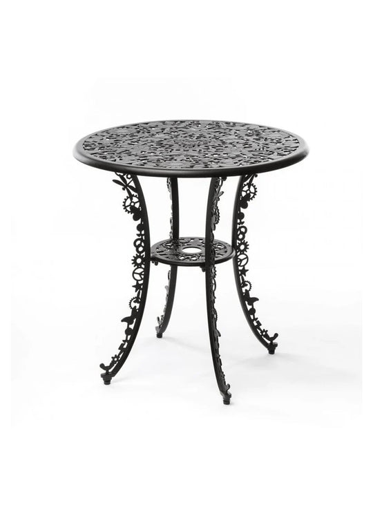 Table ronde Industry Seletti : table de jardin design, métal perforé et look unique. noir