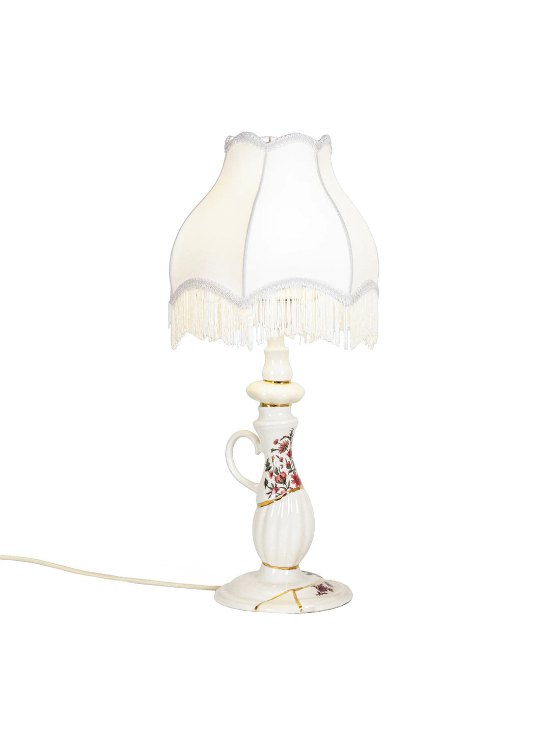 Lampe de table Kintsugi Seletti : un luminaire signé Marcantonio inspiré de l'art du kintsugi.