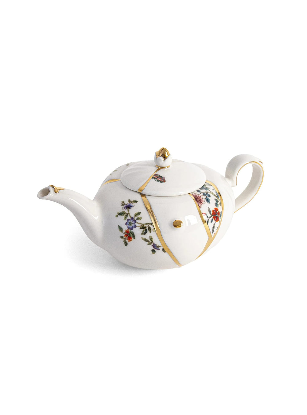 Théière Kintsugi Seletti inspirée de l’art japonais du kintsugi et de ses précieuses fissures dorées.