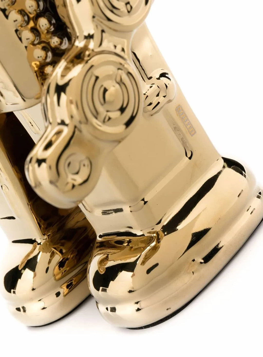 Statue My Robot Seletti : une création en porcelaine au style rétro intemporel. or