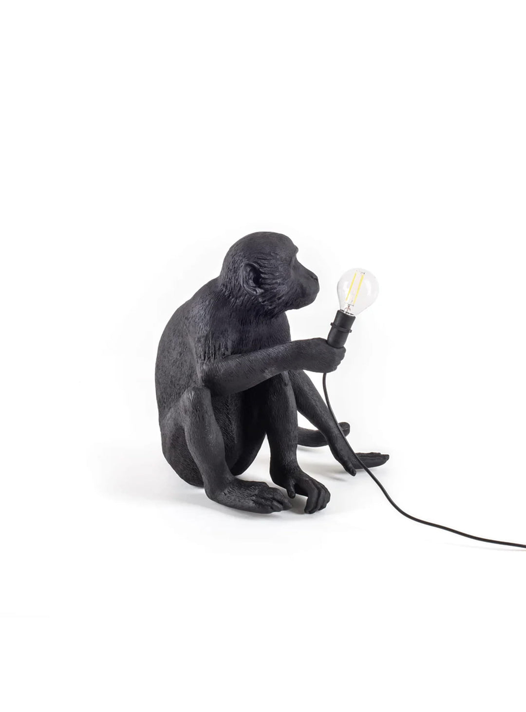 Lampe de table Monkey Seletti : luminaire design noir pour terrasse ou salon. Singe assis noir