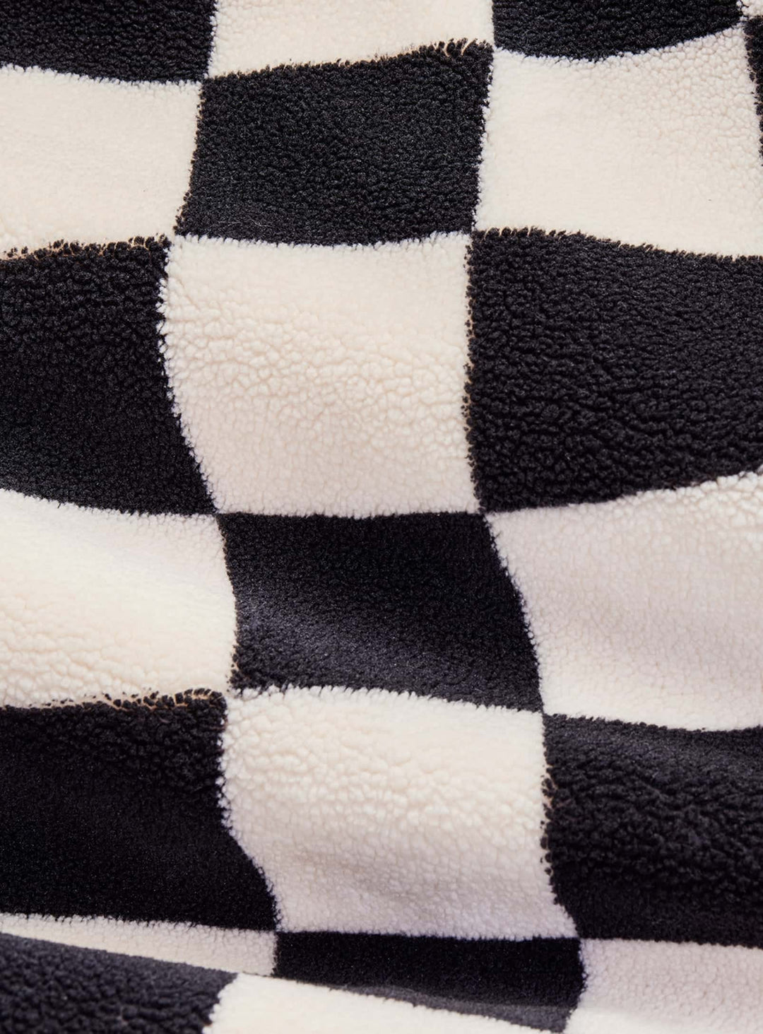 Pouf Slim Teddy Chess cosy et tendance, facile à déplacer et à associer. noir et écru