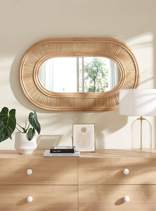 Miroir ovale Sovana : design en rotin et douceur naturelle pour vos murs.