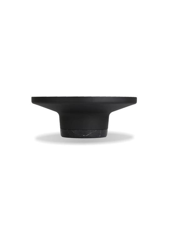 Optez pour la table à café ronde Spacer, élégance contemporaine et matériaux nobles.