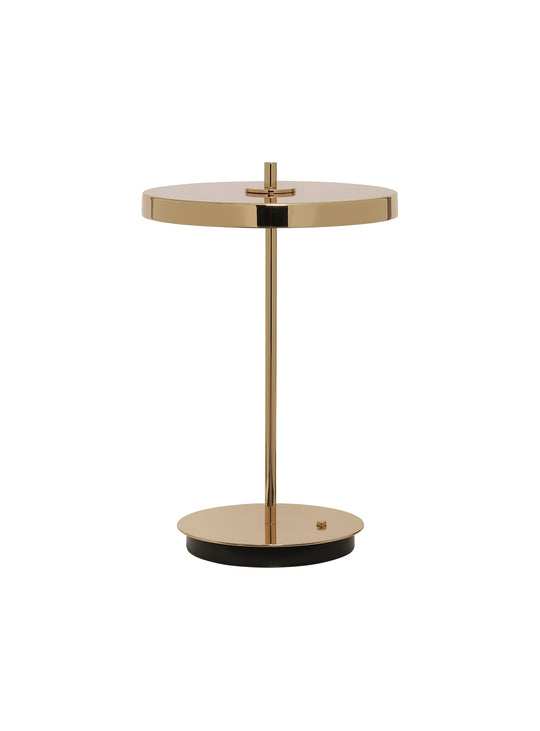 Lampe portable Asteria Move Monochrome Umage, un objet déco lumineux et fonctionnel. laiton