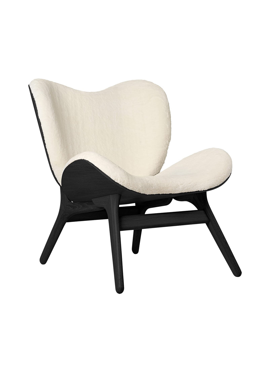 Fauteuil Umage A Conversation Piece low, ambiance chaleureuse et accueillante.