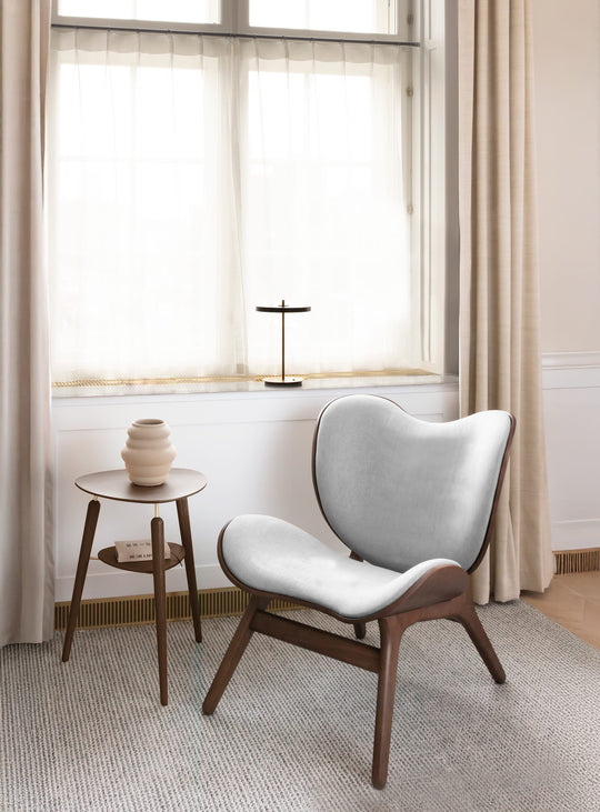 Fauteuil Umage A Conversation Piece low, design scandinave chaleureux et intemporel.