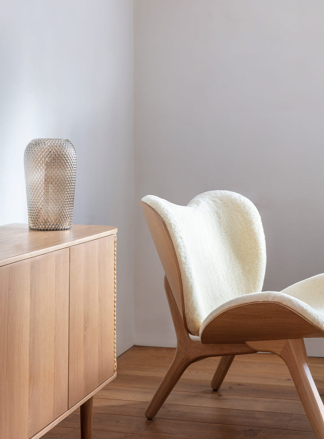 Fauteuil Umage A Conversation Piece low, une pièce forte pour intérieur raffiné.